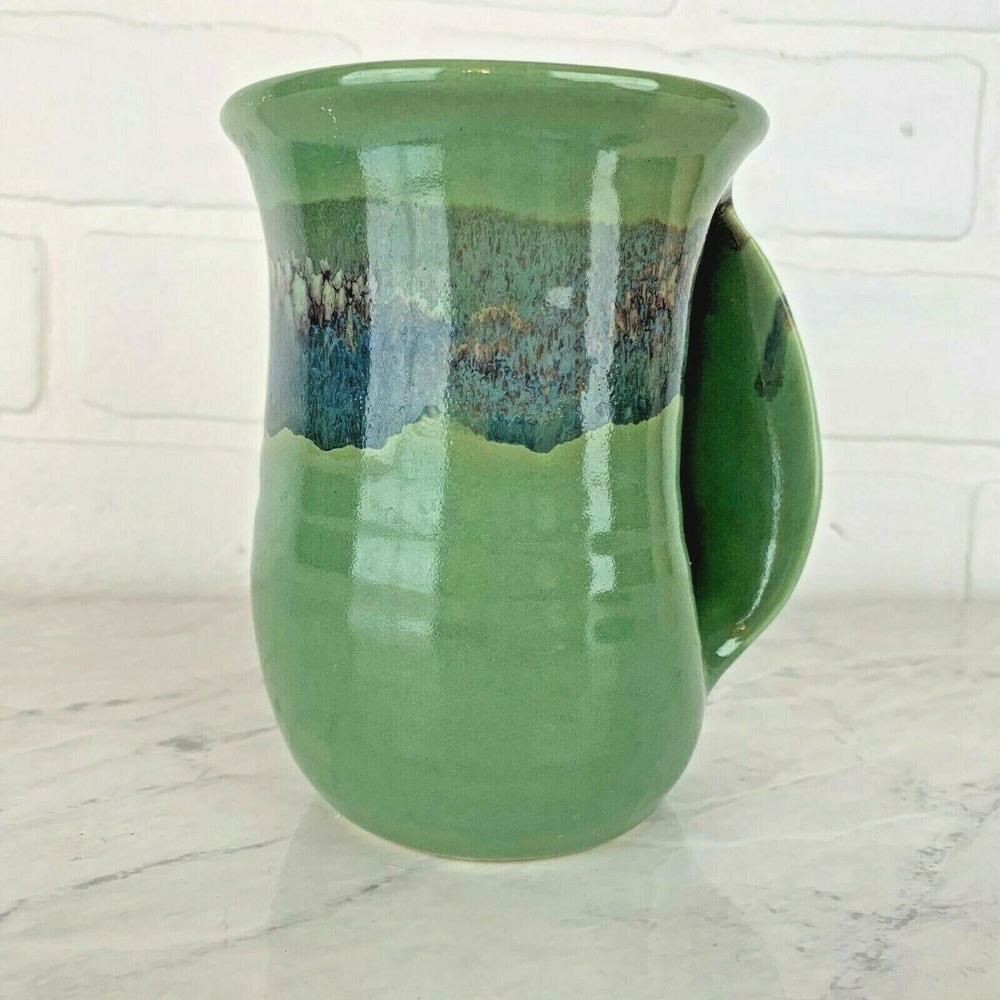 Neher Signed Clay In Motion Hand Warmer Mug Cup